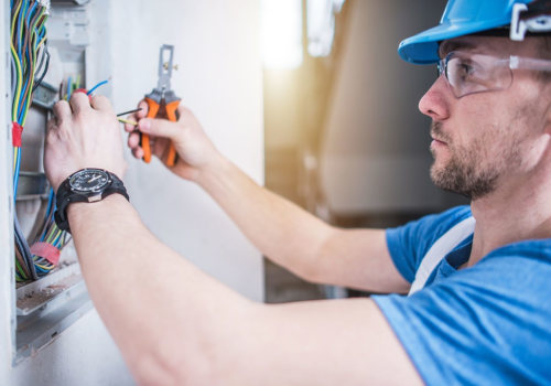 What Regulations and Codes Must Commercial Businesses Follow When Hiring an Electrician?